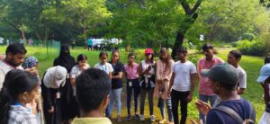 Students interacting with the environmental educator and exploring the rich biodiversity of Maharashtra Nature Park.